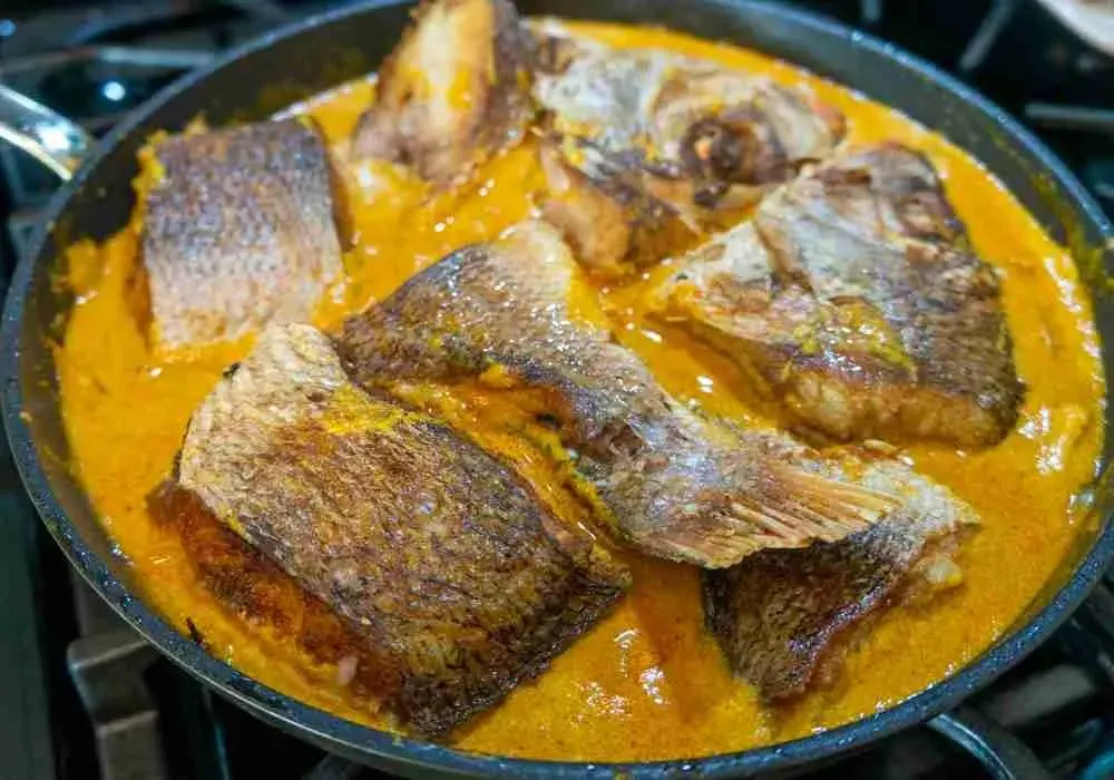 Traditional Samaki wa Nazi prepared with fresh fish and coconut sauce on the Kenyan coast