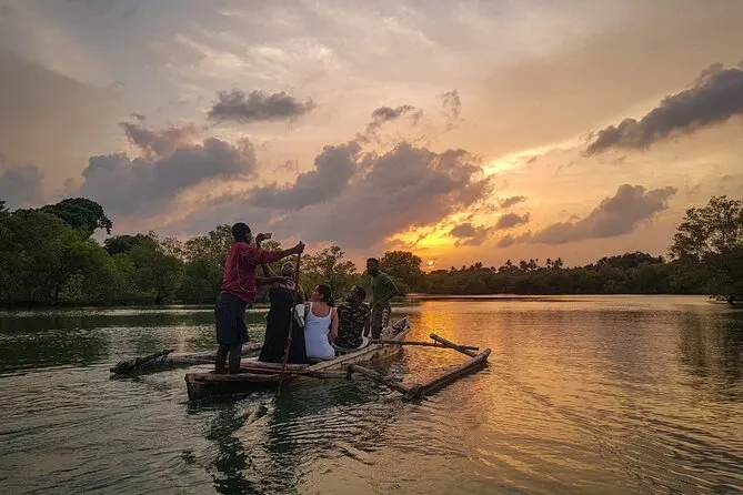 Traditional canoe on the Kongo River during the late afternoon with warm light reflecting on the water
